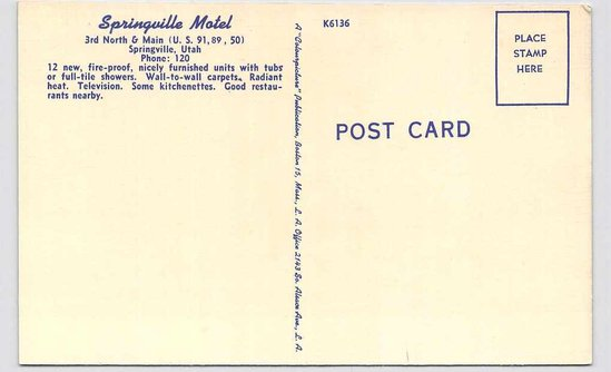 The back of the same postcard. There is text reading '12 new, fire-proof, nicely furnished units with tubs or full-tile showers. Wall-to-wall carpets. Radiant heat. Television. Some kitchenettes. Good restaurants nearby.' There is also a place to put a stamp, and text reading 'Post Card.'